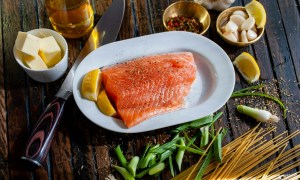 Raw salmon on plate