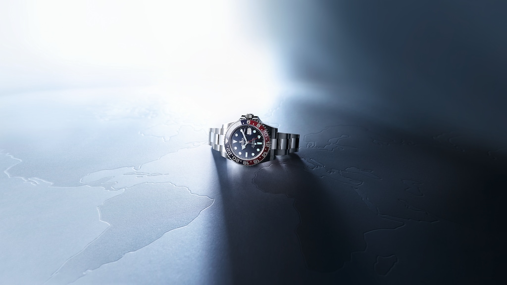 Rolex GMT Master II watch on table