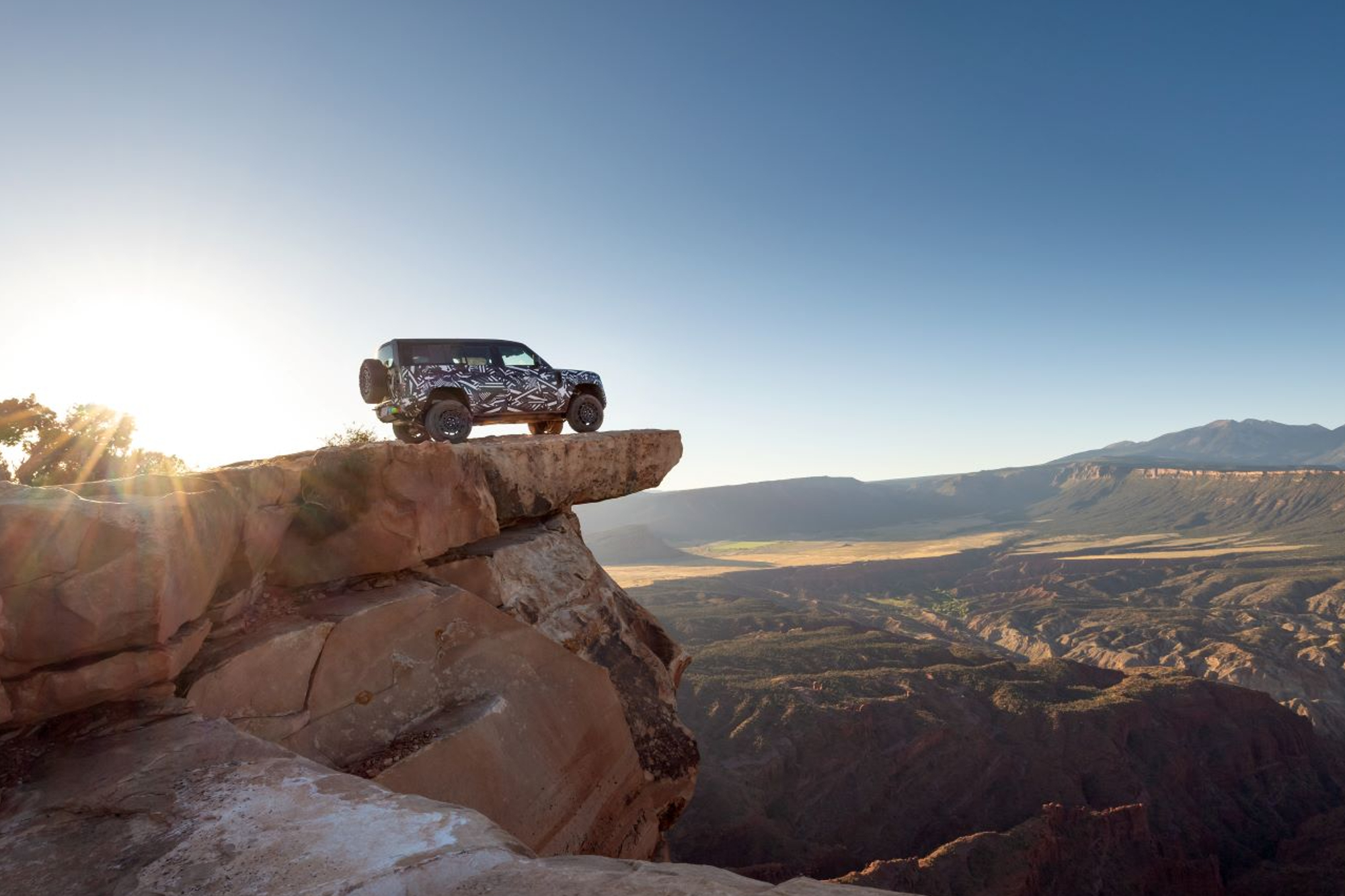 2025 Defender OCTA limited high-performance edition parked on a mountain overlook.