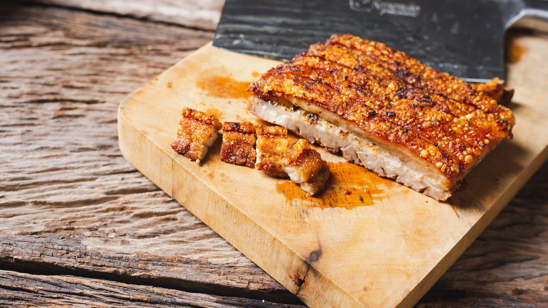 Pork belly on cutting board