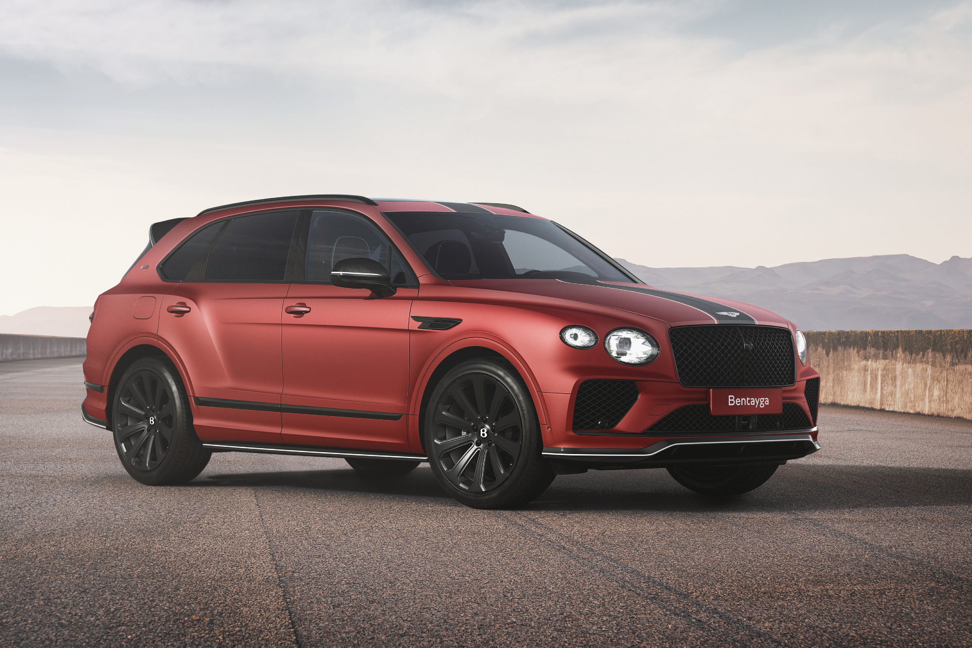 Bentayga Apex Edition limited edition of just 20 cars right front three-quarter view parked on a dirt track.