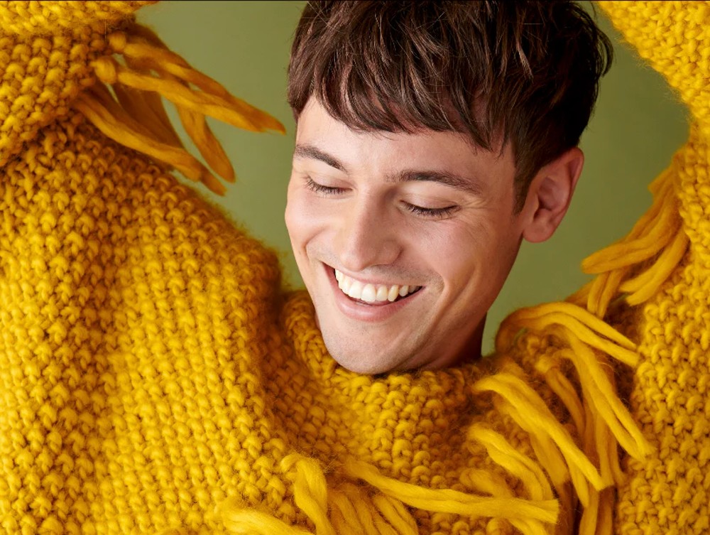 Tom Daley wearing knit sweater