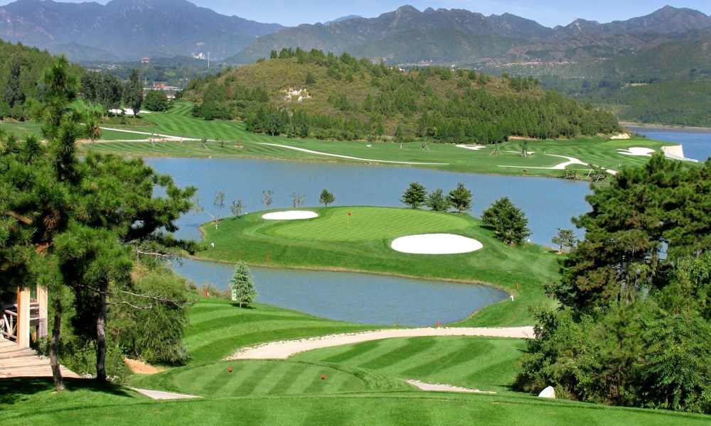 A golf course with water views.