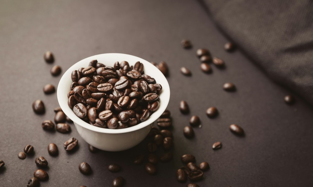 Coffee beans in white bowl