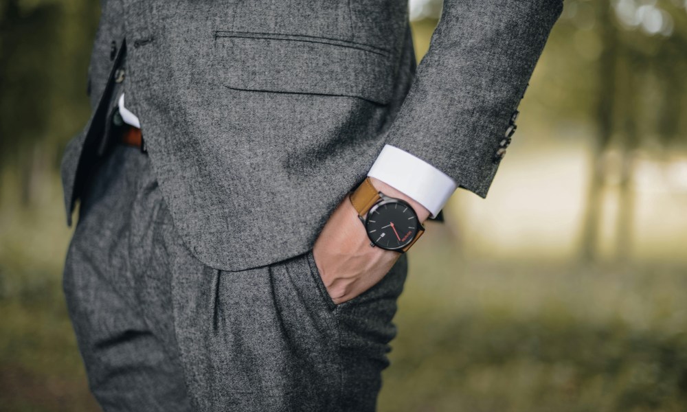 Man in suit wearing a watch