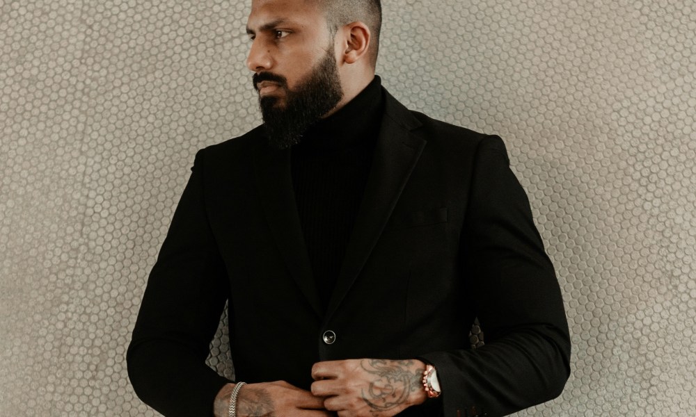 Man with beard in suit