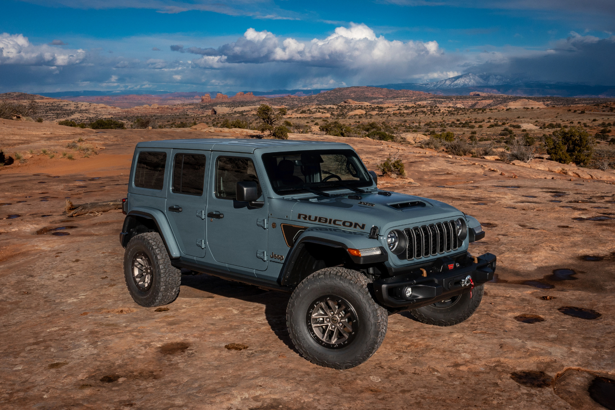 2025 Jeep Wranger 392 Final Edition parked in the desert with clouds in the background.