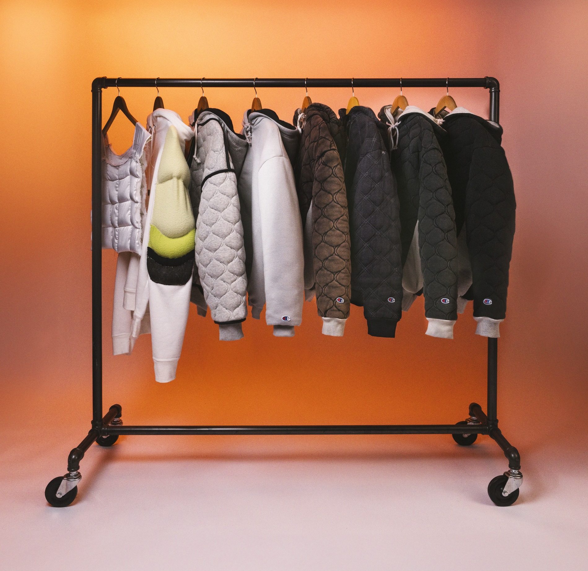 champion weighted hoodies on rack