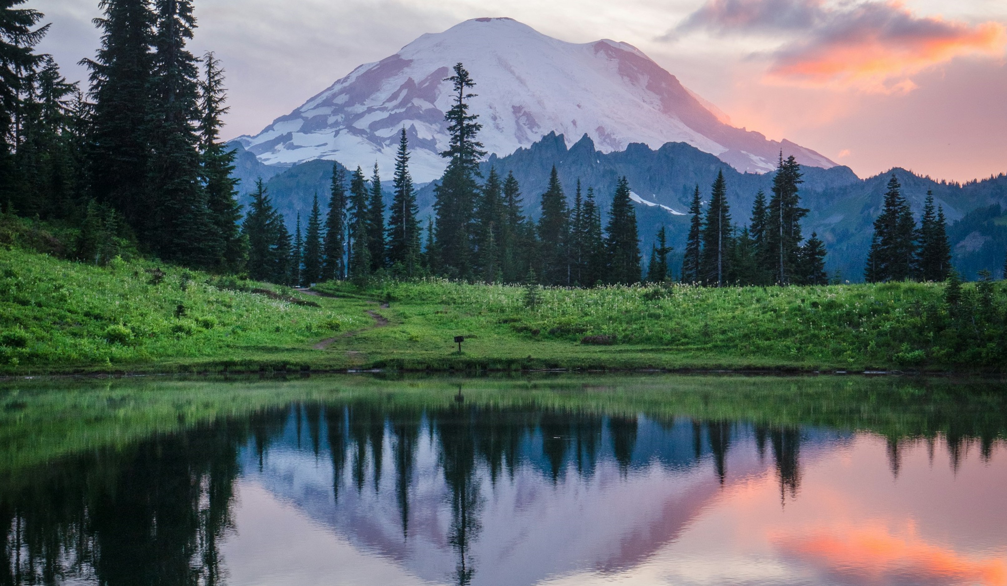 Mount Rainier, a water view, and a pink warm sky view.