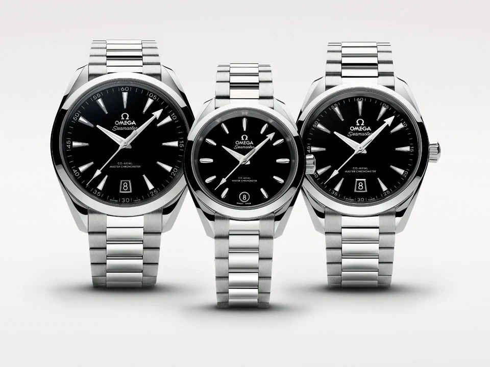 three Omega black dial watches