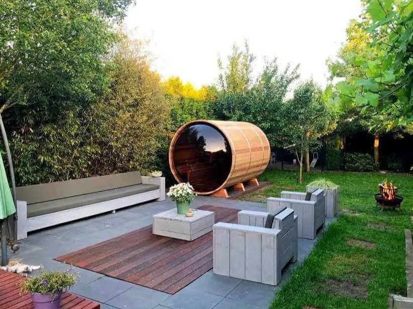 Dundalk Panoramic Barrel Sauna in the backyard with elegance.