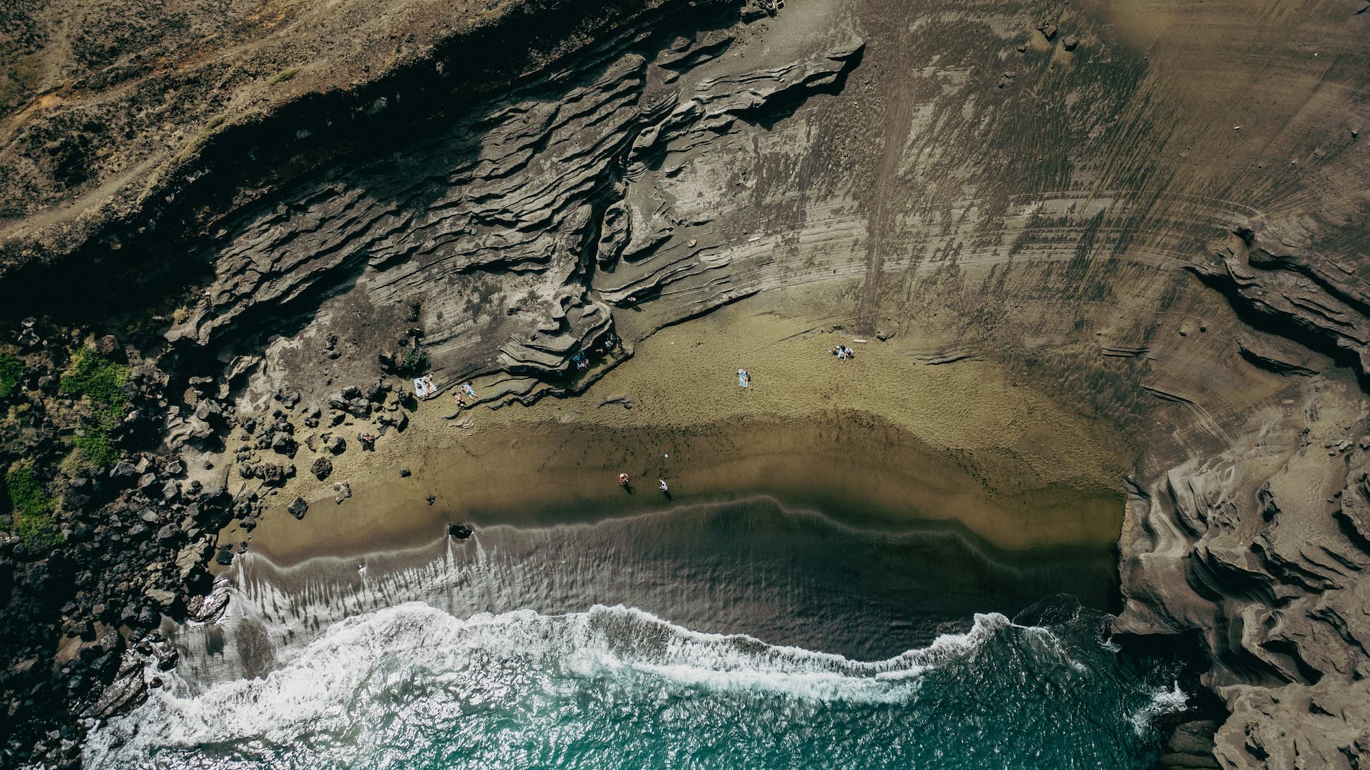 top view of a green sand beach in hawaii