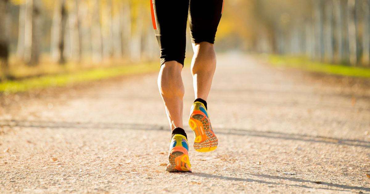 man jogging in colorful shoes 