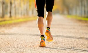 man jogging in colorful shoes