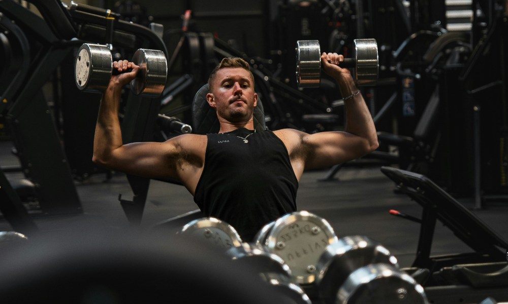 Man doing incline chest press.