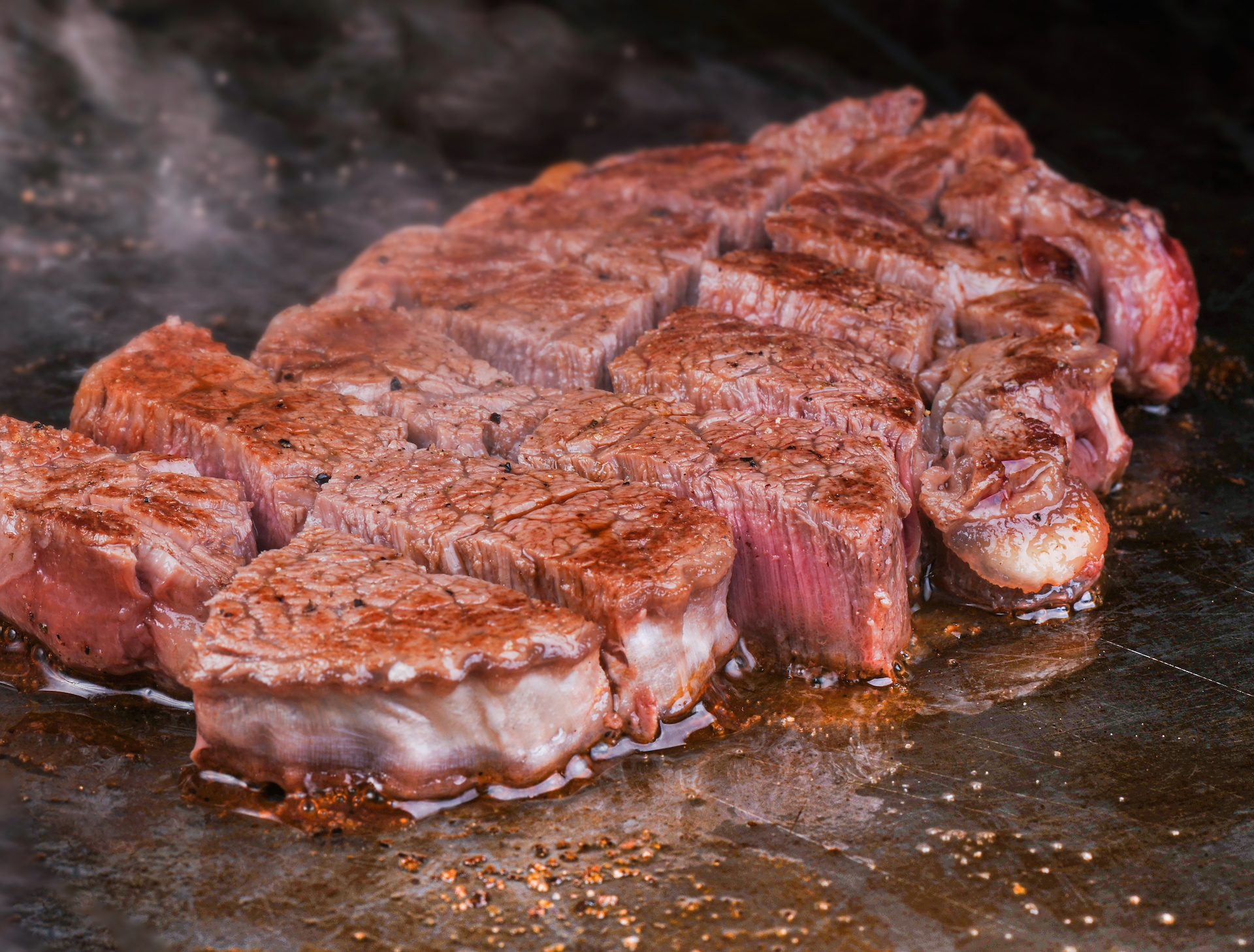 Sliced steak cooking