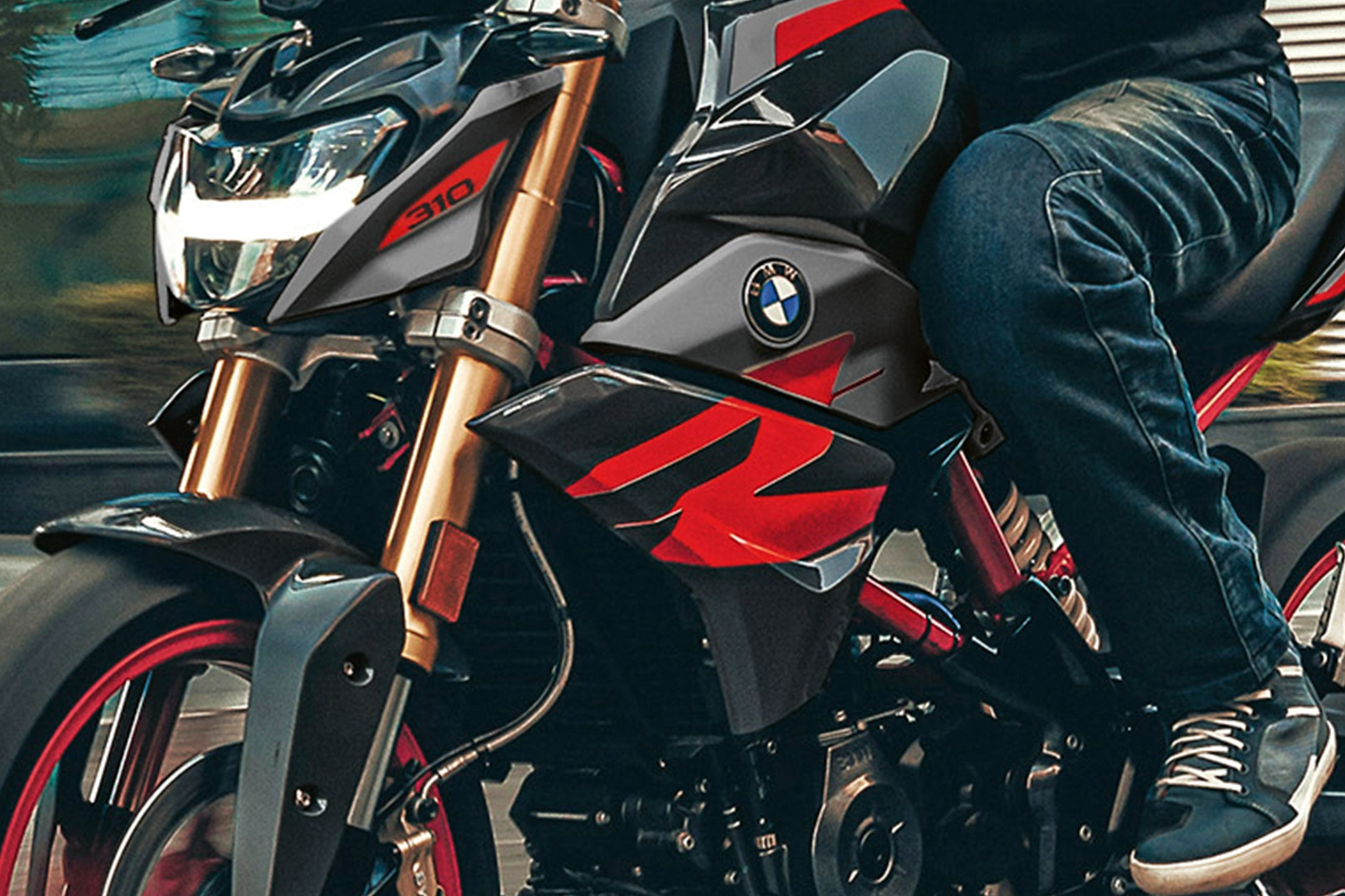 BMW G 310 R closeup of bike with a rider.