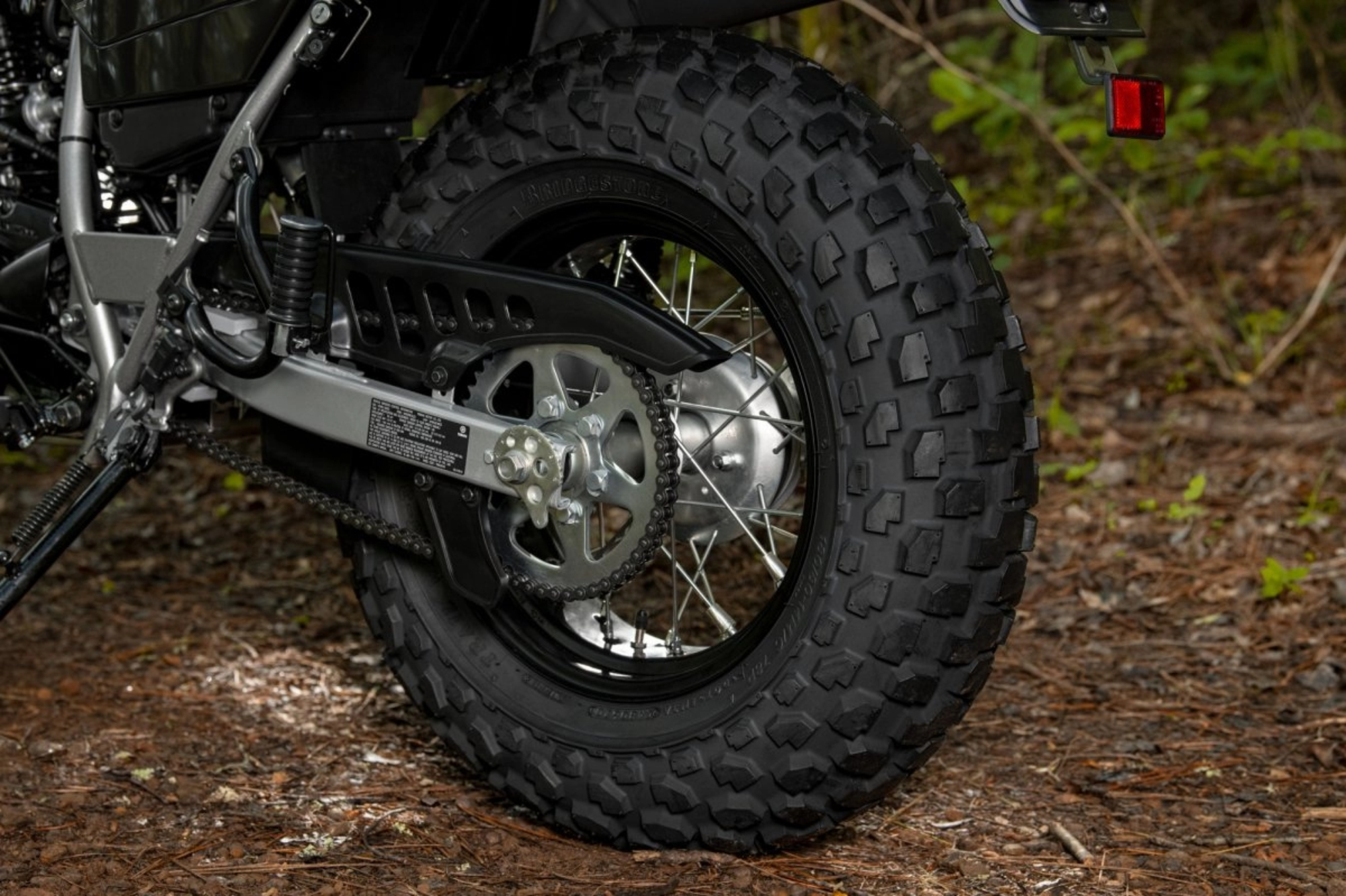 Yamaha TW200 with agressive tread wide tires that let you ride anywhere.