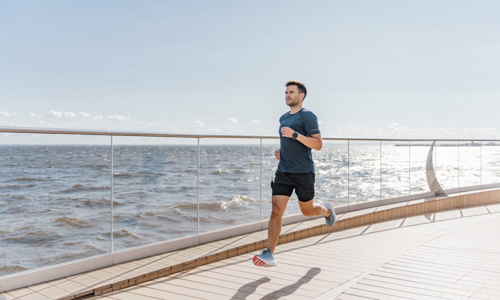 Man running by water