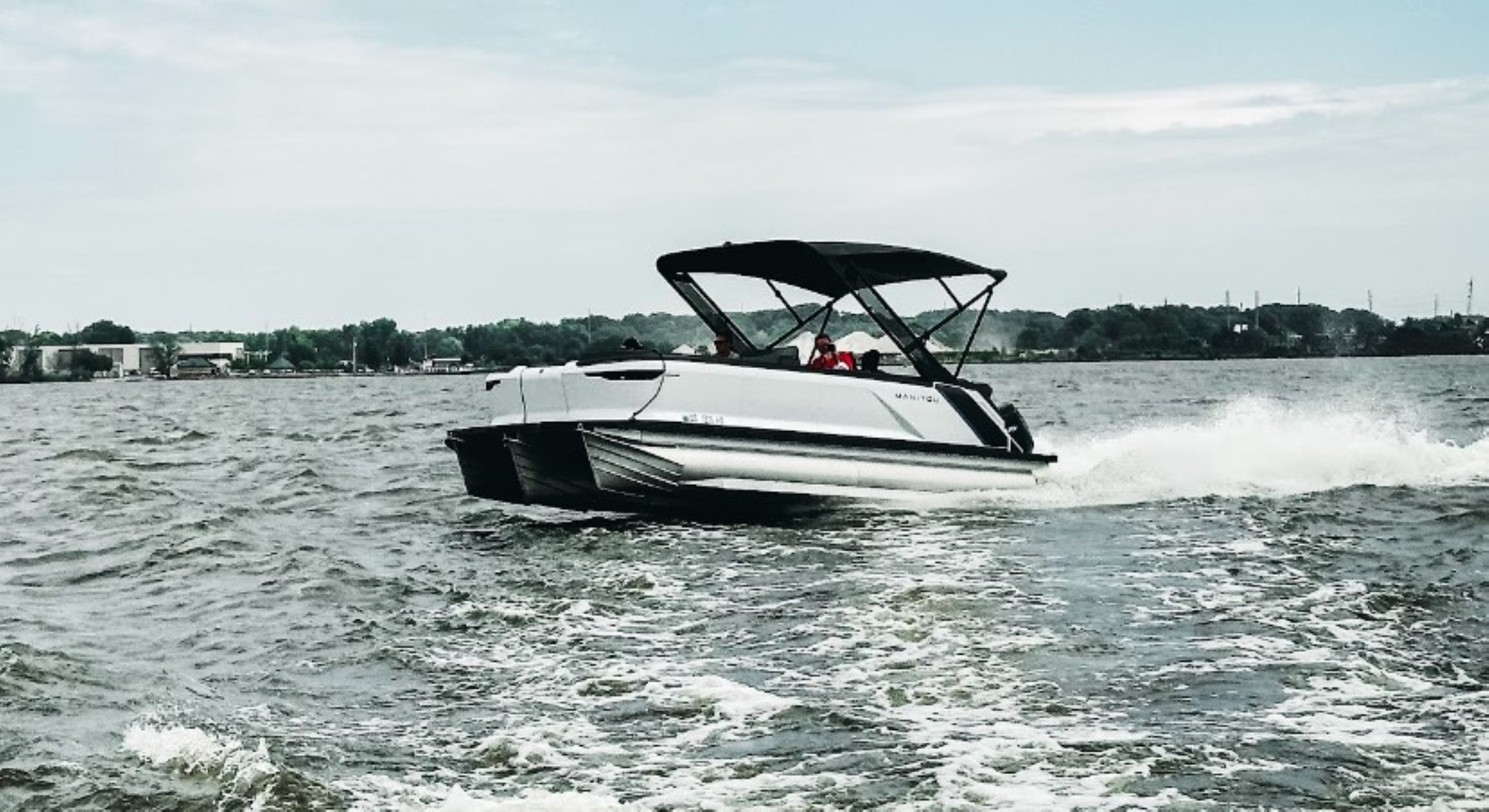 Manitou boat on the water