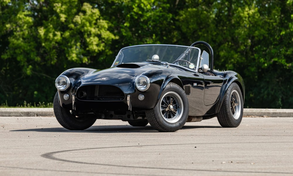 1963 Shelby 289 Cobra driven by Steve McQueen left front three-quarter view.