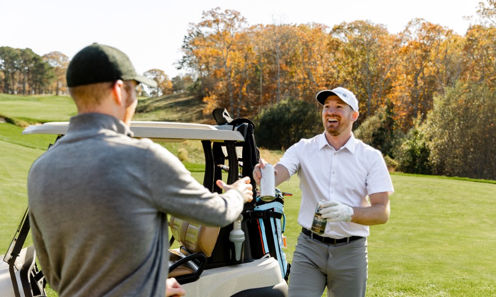 Men playing golf in the fall