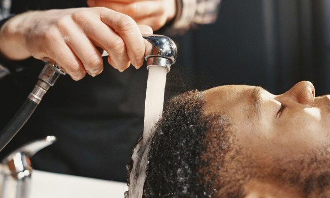 Man getting hair washed in salon