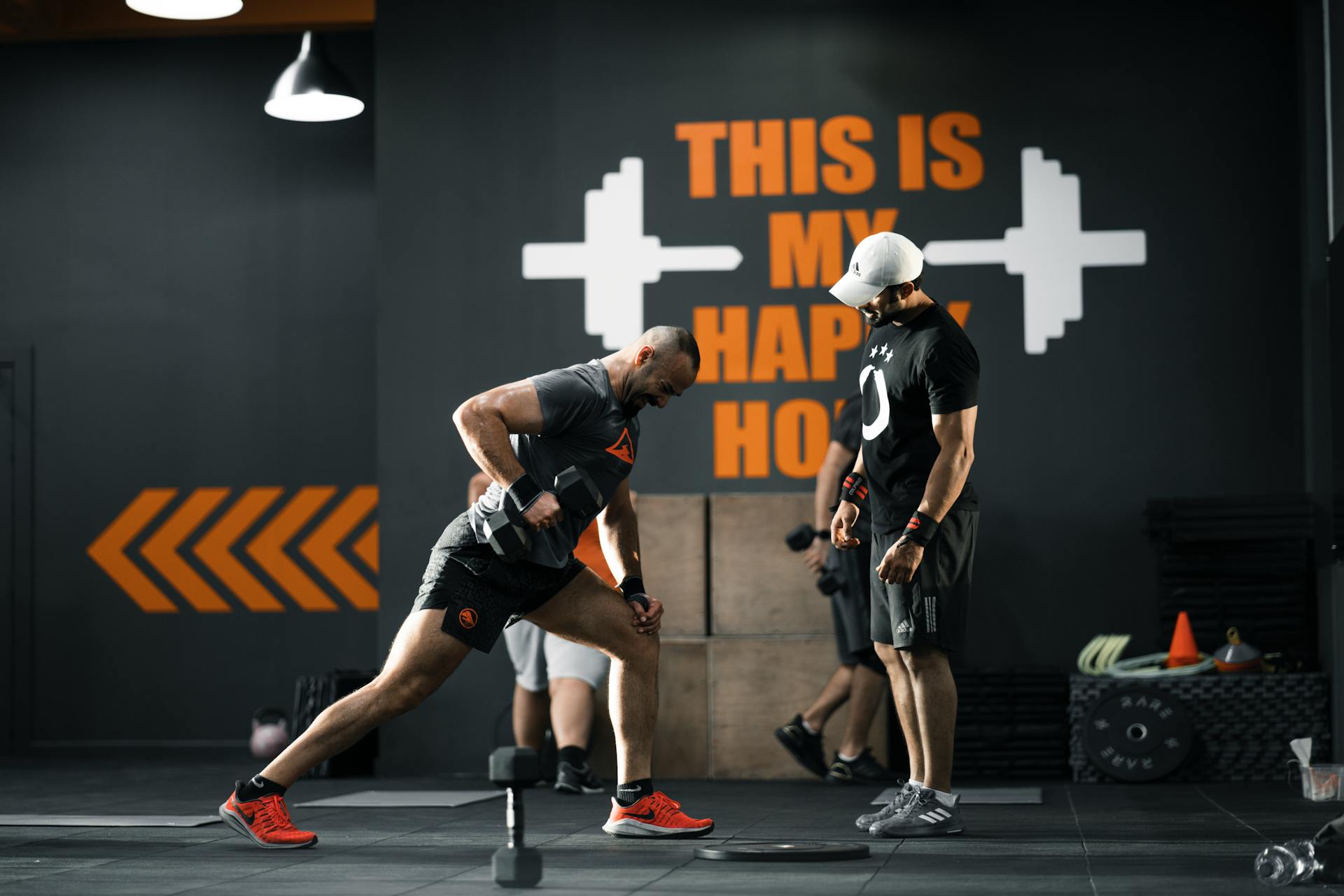 Two men working out in gym