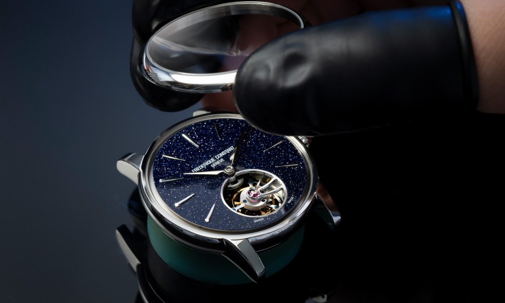 Watchmaker putting together classic tourbillon manufacture