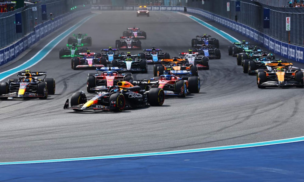 Race cars at the start of the 2024 F1 Miami Grand Prix.