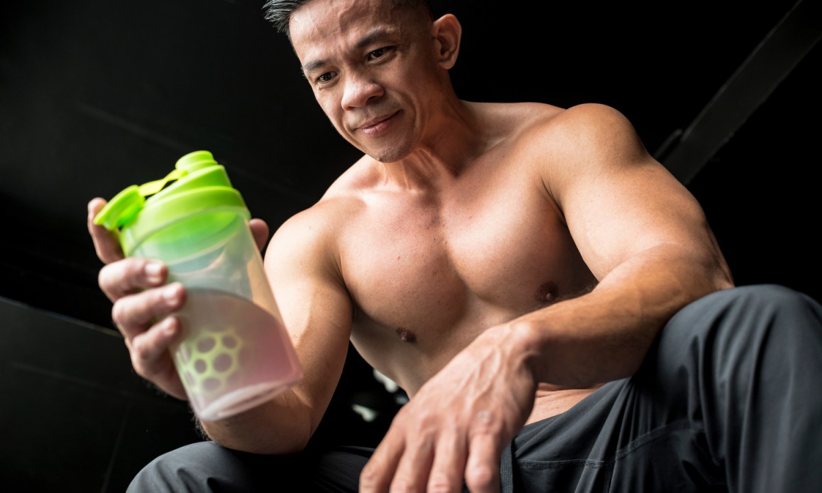 Man with pre-workout drink