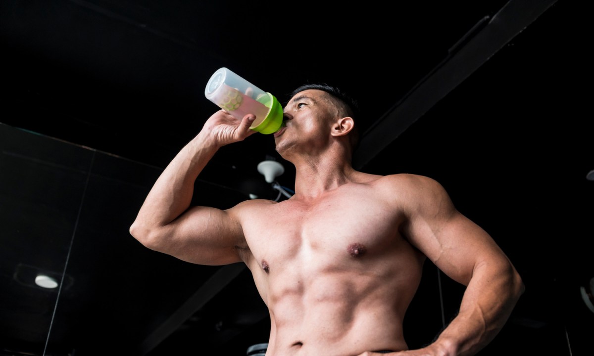 Man drinking pre workout.