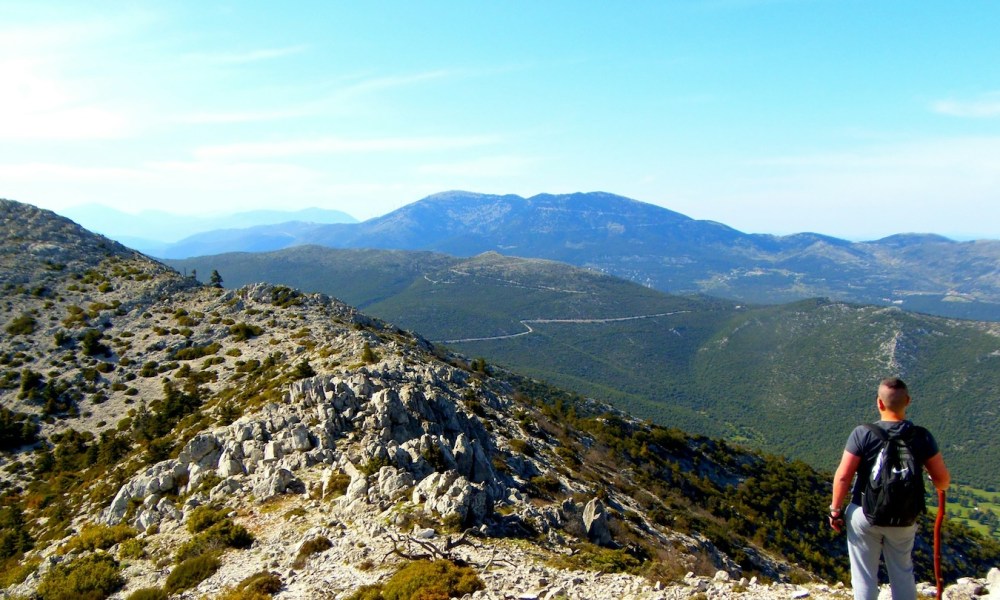 man hiking in mountains