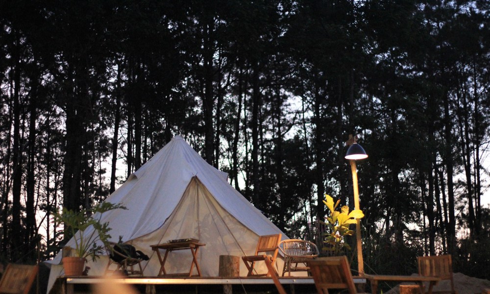 A fancy glamping setup at dusk.