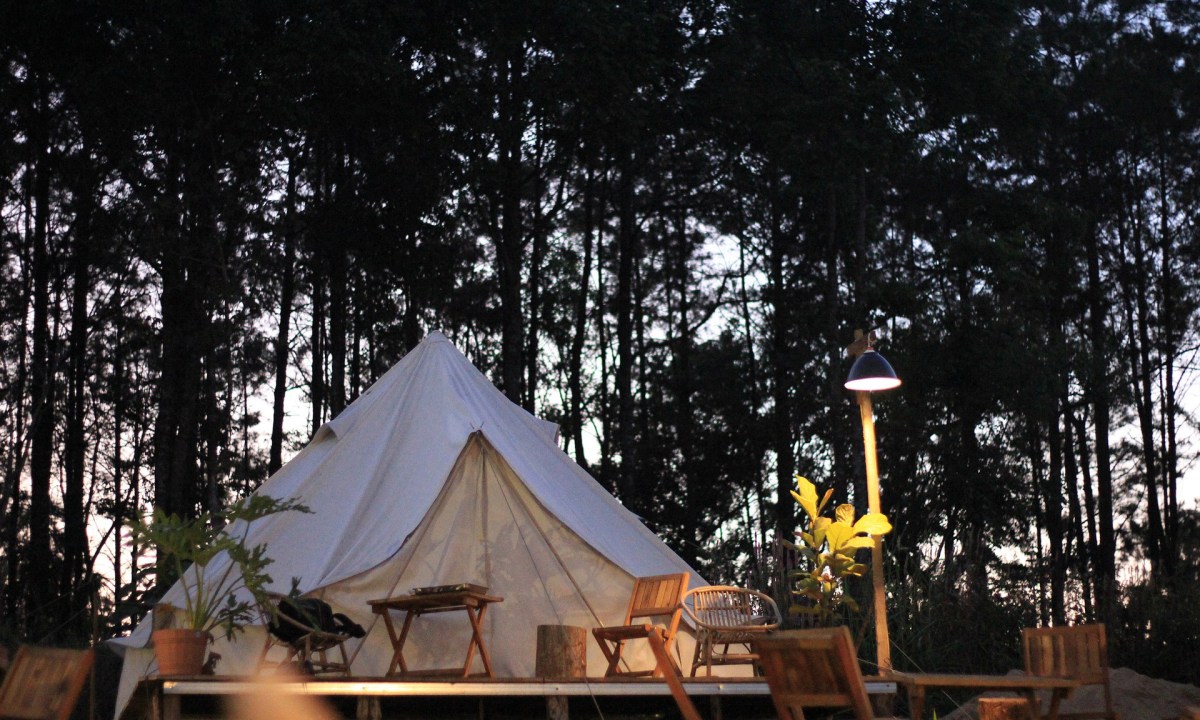 A fancy glamping setup at dusk