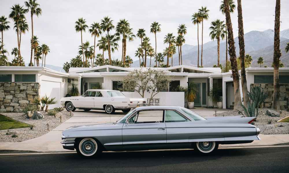 a car in front of a house in palm springs