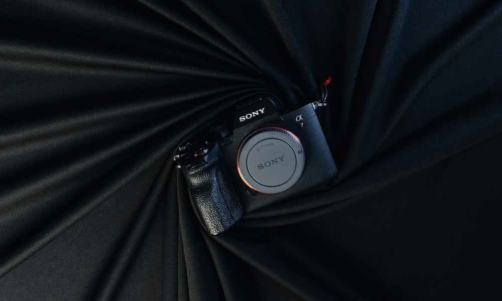 sony alpha camera on a black background