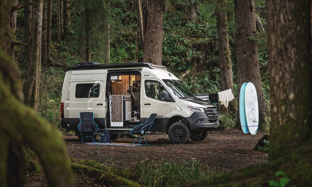 Tiffin GH1 Camper Van parked in the forest.