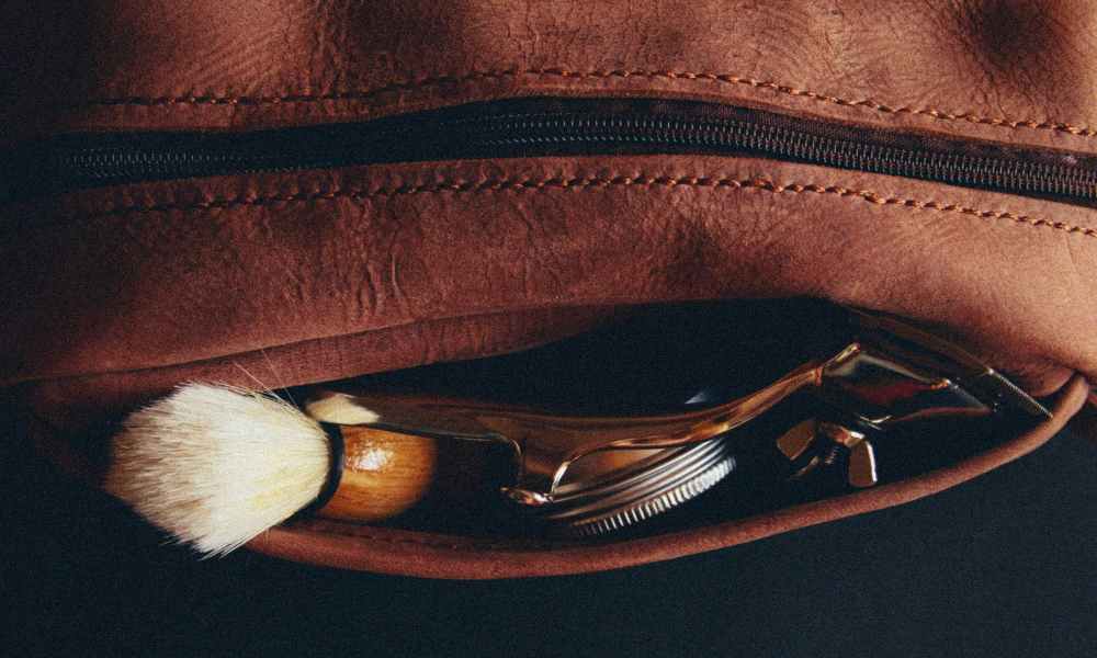 leather pouch with shaving brush and razor