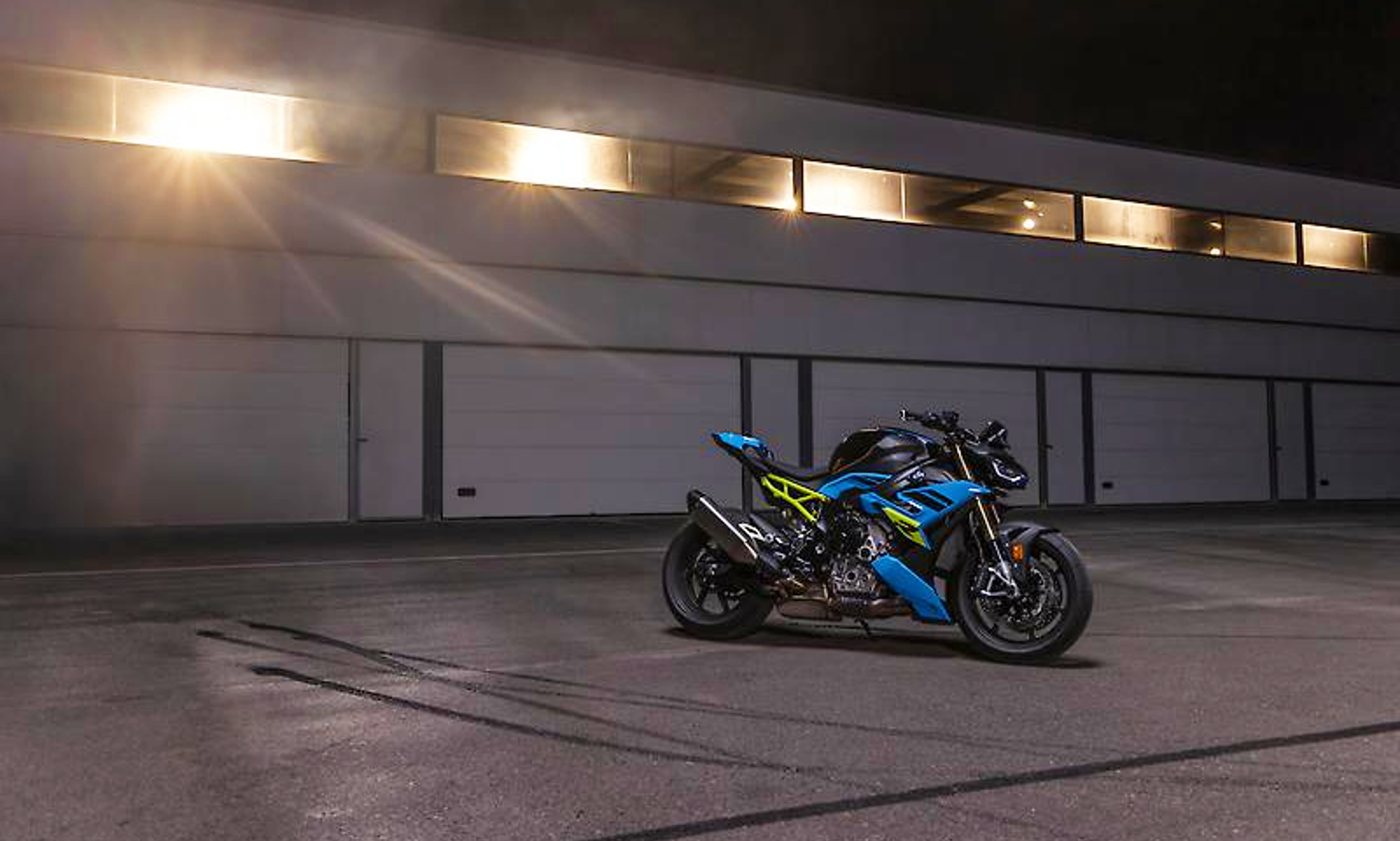 2025 BMW S 1000 R parked in a large garage.