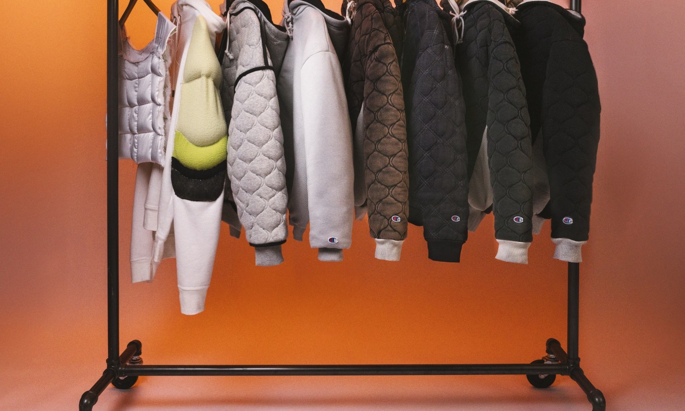 Champion hero weighted hoodies on a rack -- featured image