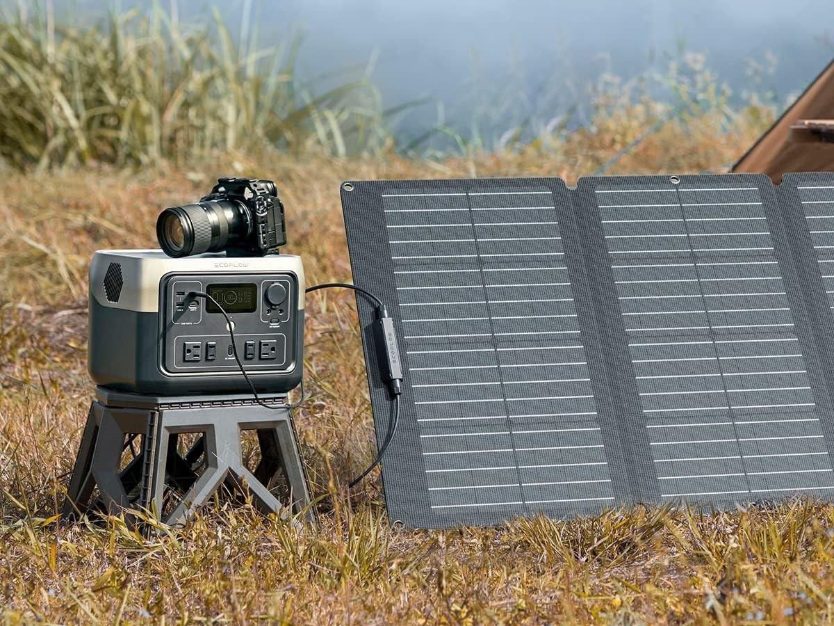 The Ecoflow River 2 Max solar generator charging outdoors.