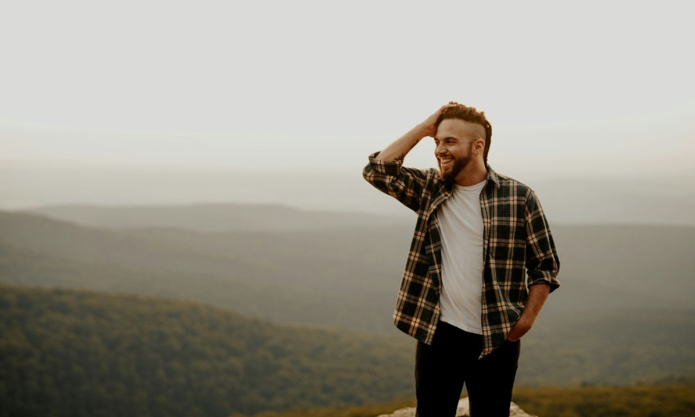 Man with open flannel