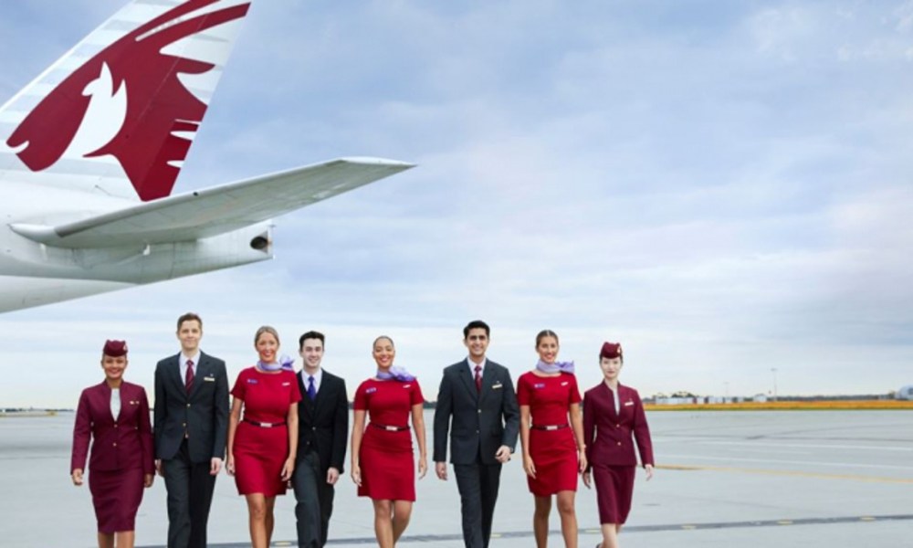 Qatar Airways airplane and people