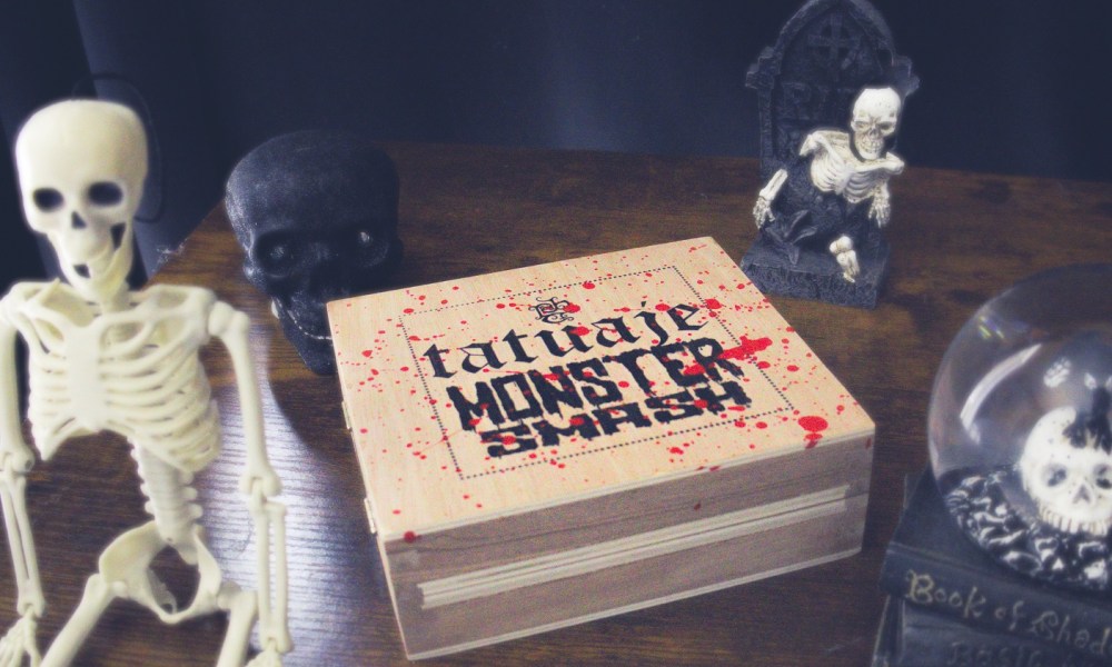 Tatuaje Monster Smash box art on table with Halloween decor -- Briley Kenney The Manual