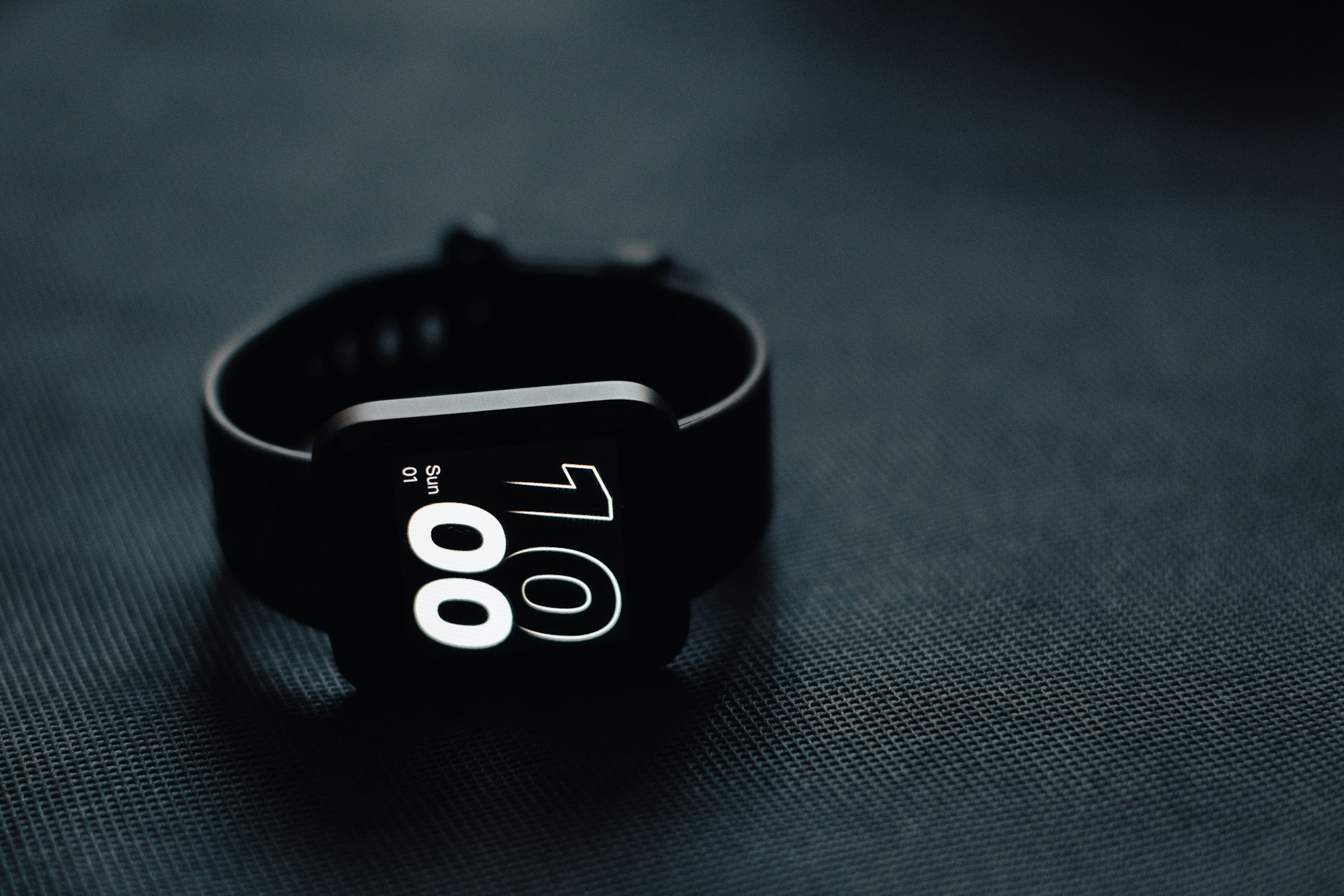 fitness tracker smart watch black on table close up