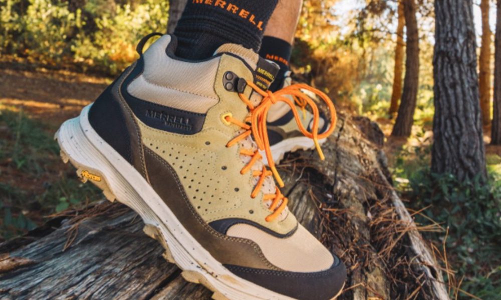 man wearing merrell hiking boots in nature