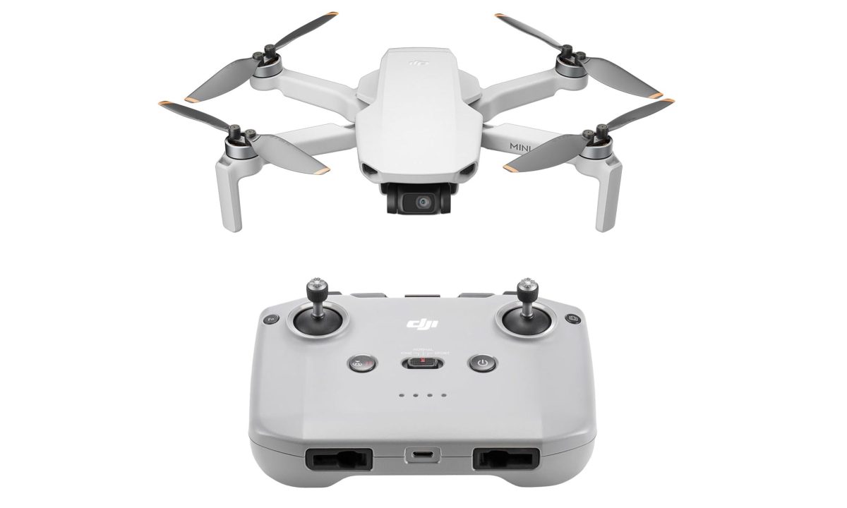 A DJI Mini 4K drone with its controller.