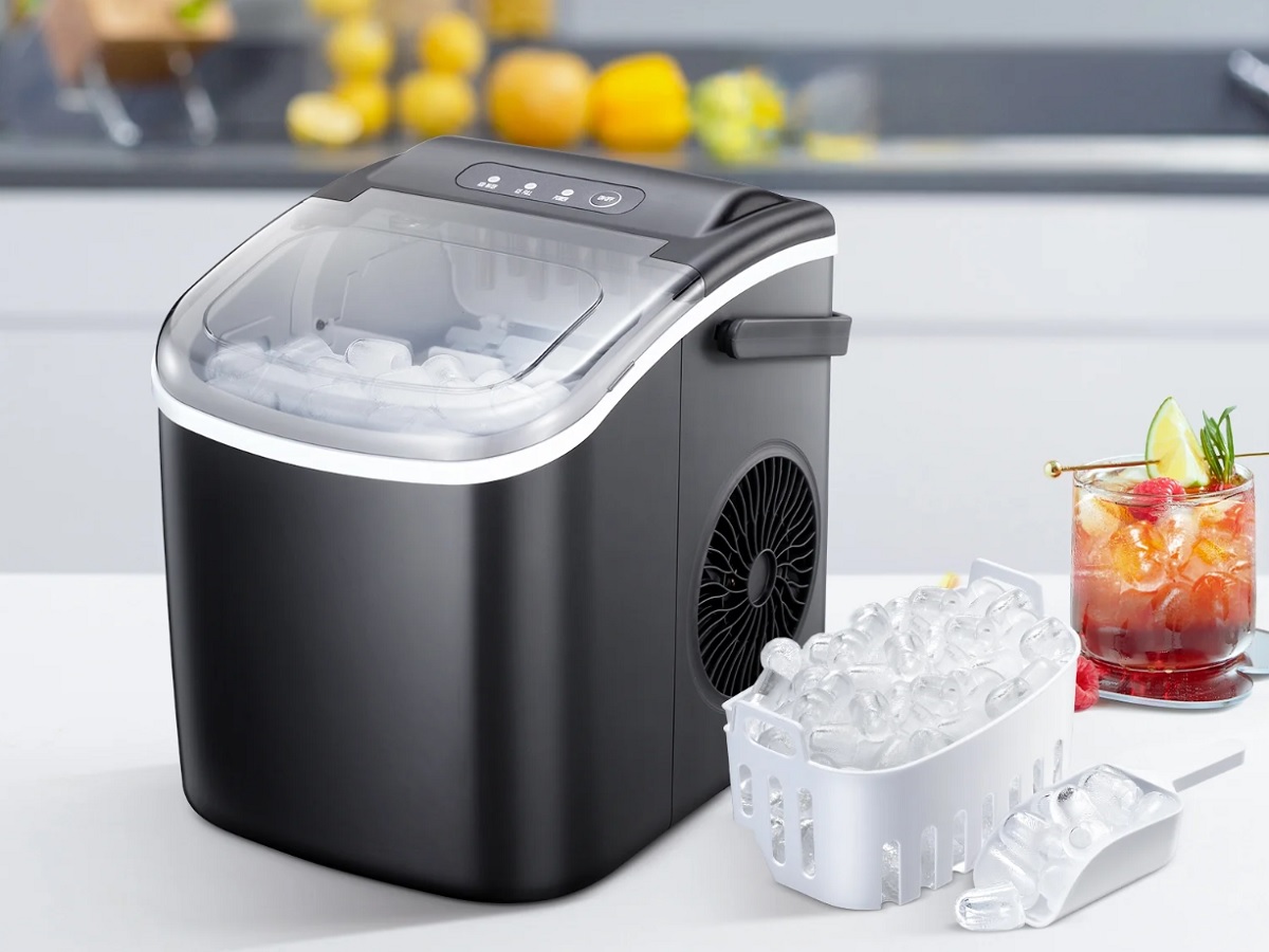 The KissAir Countertop Ice Maker making ice in the kitchen.