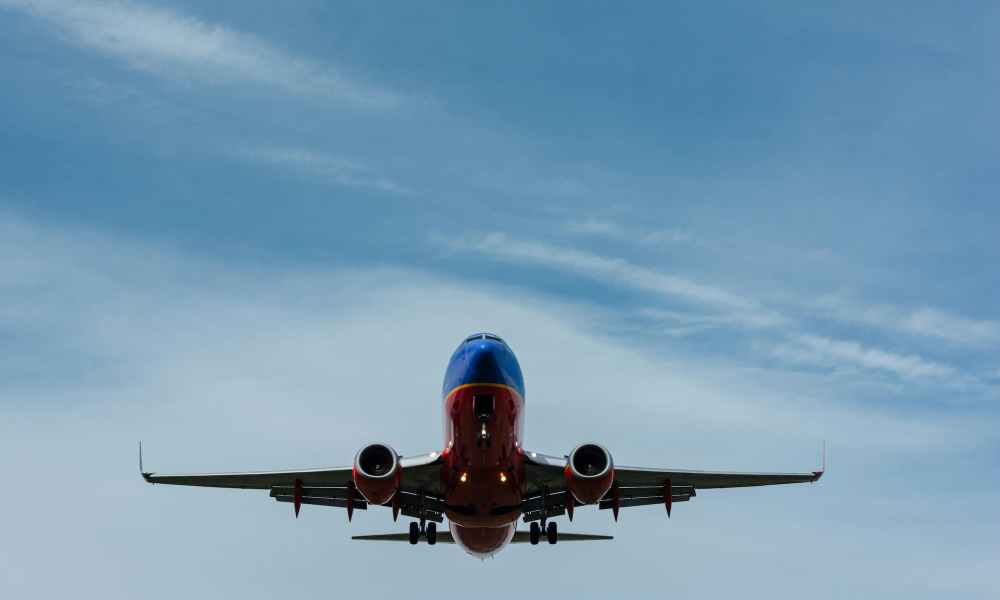 Blue and red airplane in the sky